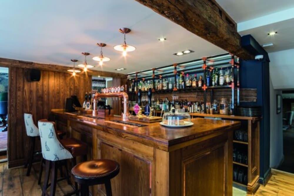 The Fleece At Cirencester Exterior photo The bar at The Old Dispensary